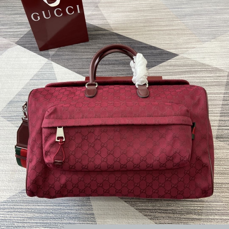 G*u*i top handle bags